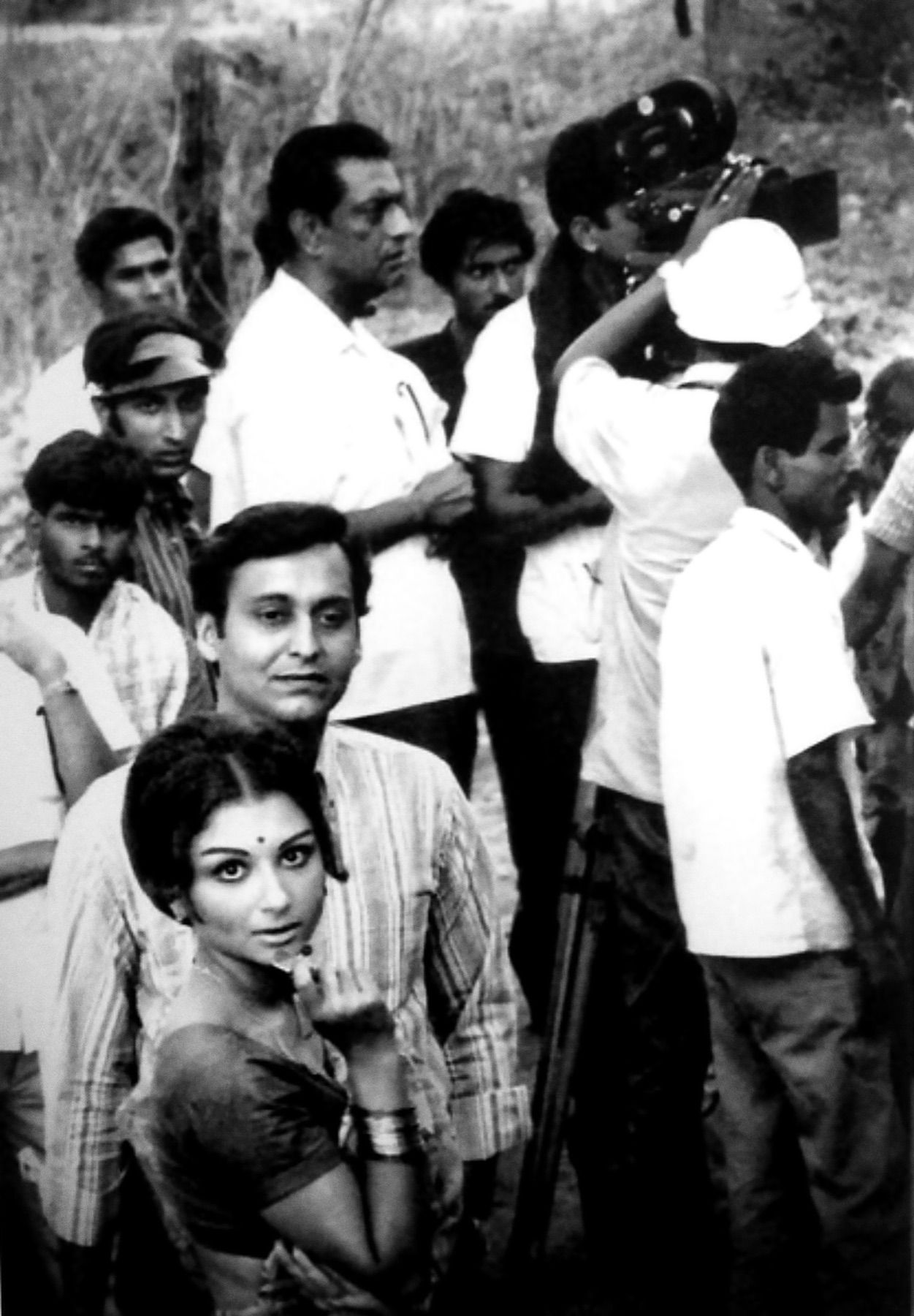 Ray on the set with Soumitra Chatterjee and Sharmila Tagore